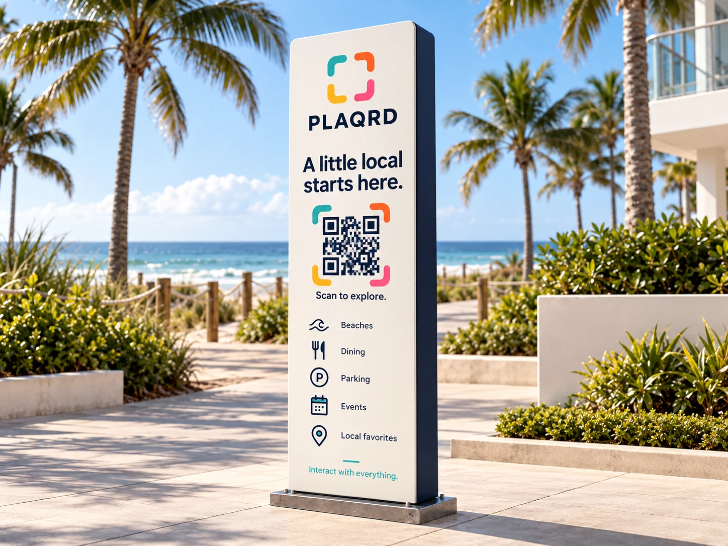 A warm ivory PLAQRD city-guide monolith beside a palm-lined beach path